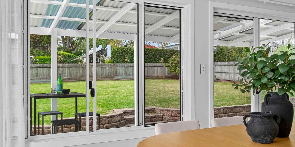Security screen fitted to a residential door and window system
